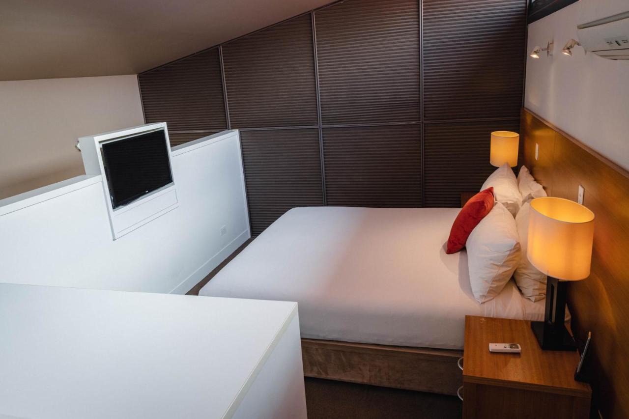 The Henry Jones Art Hotel Hobart Eksteriør billede A bedroom in a typical apartment