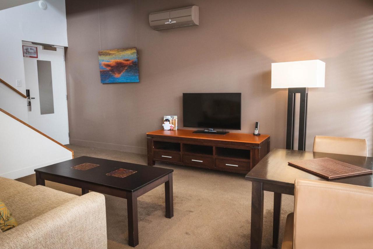 The Henry Jones Art Hotel Hobart Eksteriør billede A living room in a typical apartment at the Village at Grand Traverse Commons